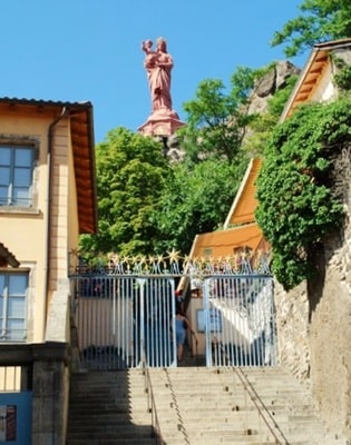 Rocher Corneille and Notre-Dame de France Statue